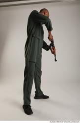 Man Adult Average Black Fighting with gun Standing poses Army